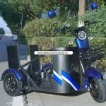 Elektrické koloběžky, elektrické tříkolky Elektrická tříkolka určená pro převoz osob na invalidním vozíku. Elektrické koloběžky, elektrické tříkolky Elektrické koloběžky, elektrické tříkolky Elektrická tříkolka určená pro převoz osob na invalidním vozíku. Elektrické koloběžky, elektrické tříkolky