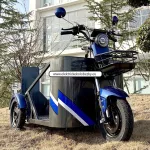 Elektrické koloběžky, elektrické tříkolky Elektrická tříkolka určená pro převoz osob na invalidním vozíku. Elektrické koloběžky, elektrické tříkolky Elektrické koloběžky, elektrické tříkolky Elektrická tříkolka určená pro převoz osob na invalidním vozíku. Elektrické koloběžky, elektrické tříkolky